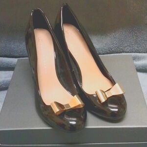 LC Lauren Conrad Patent Leather, metal Bow Heels, size 9
